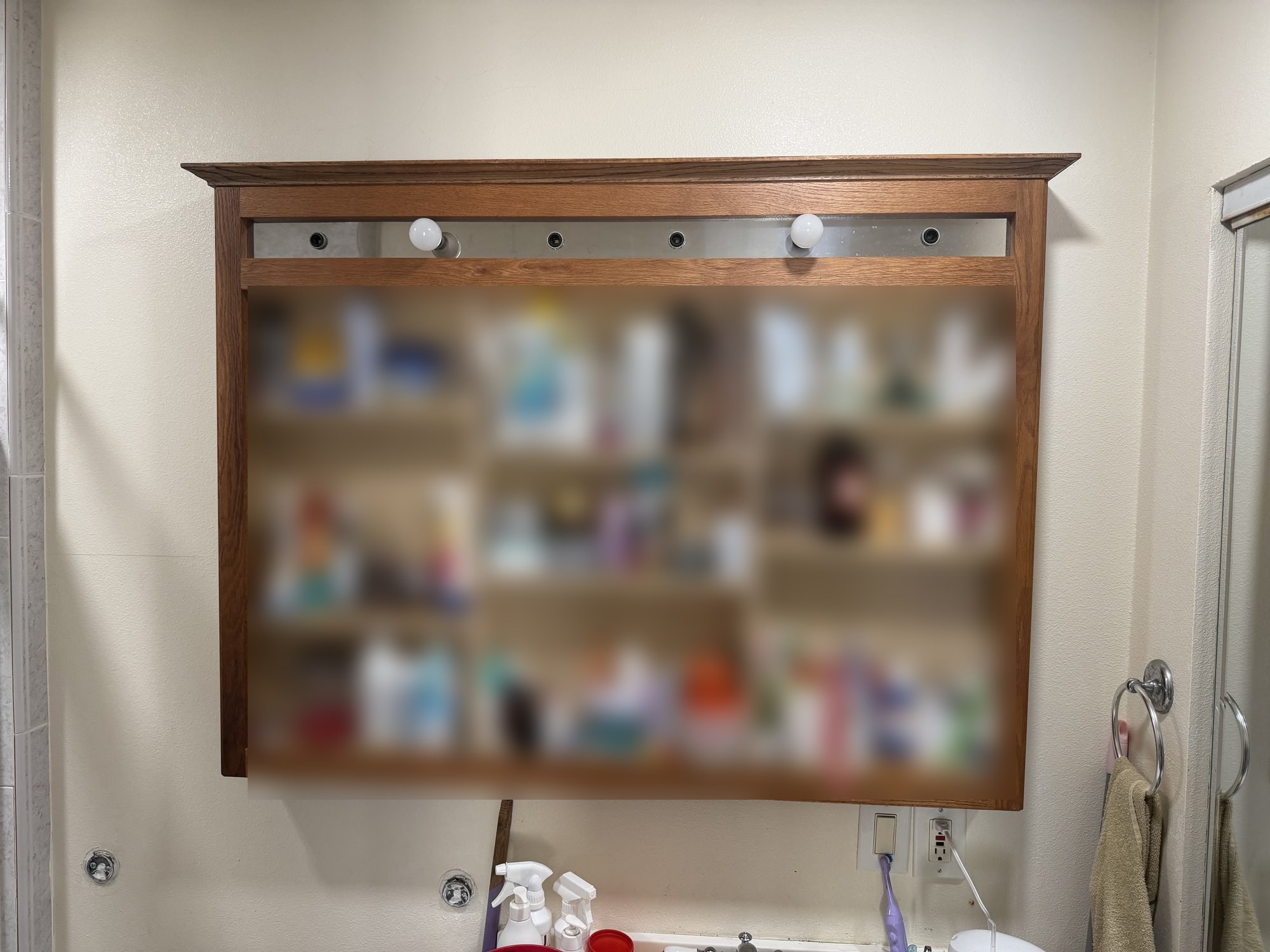 Old medicine cabinet before replacement