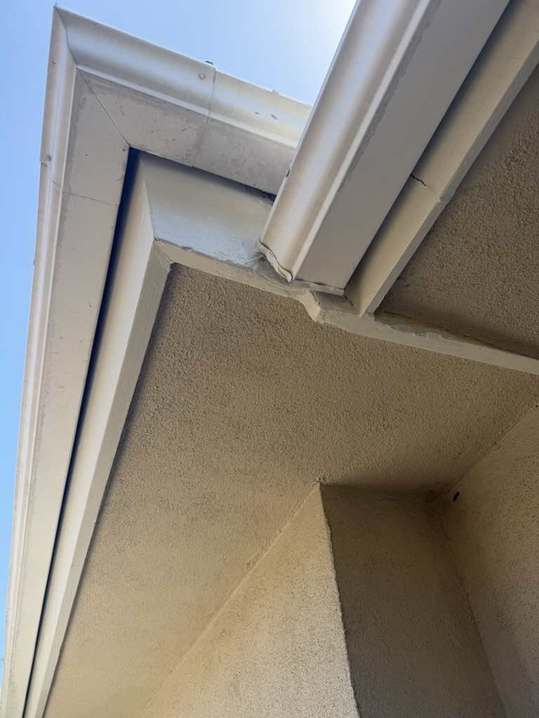 Repainted fascia corner detail after repair