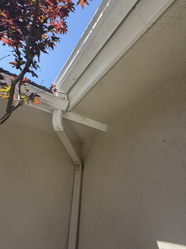 Final view of repaired and repainted fascia corner