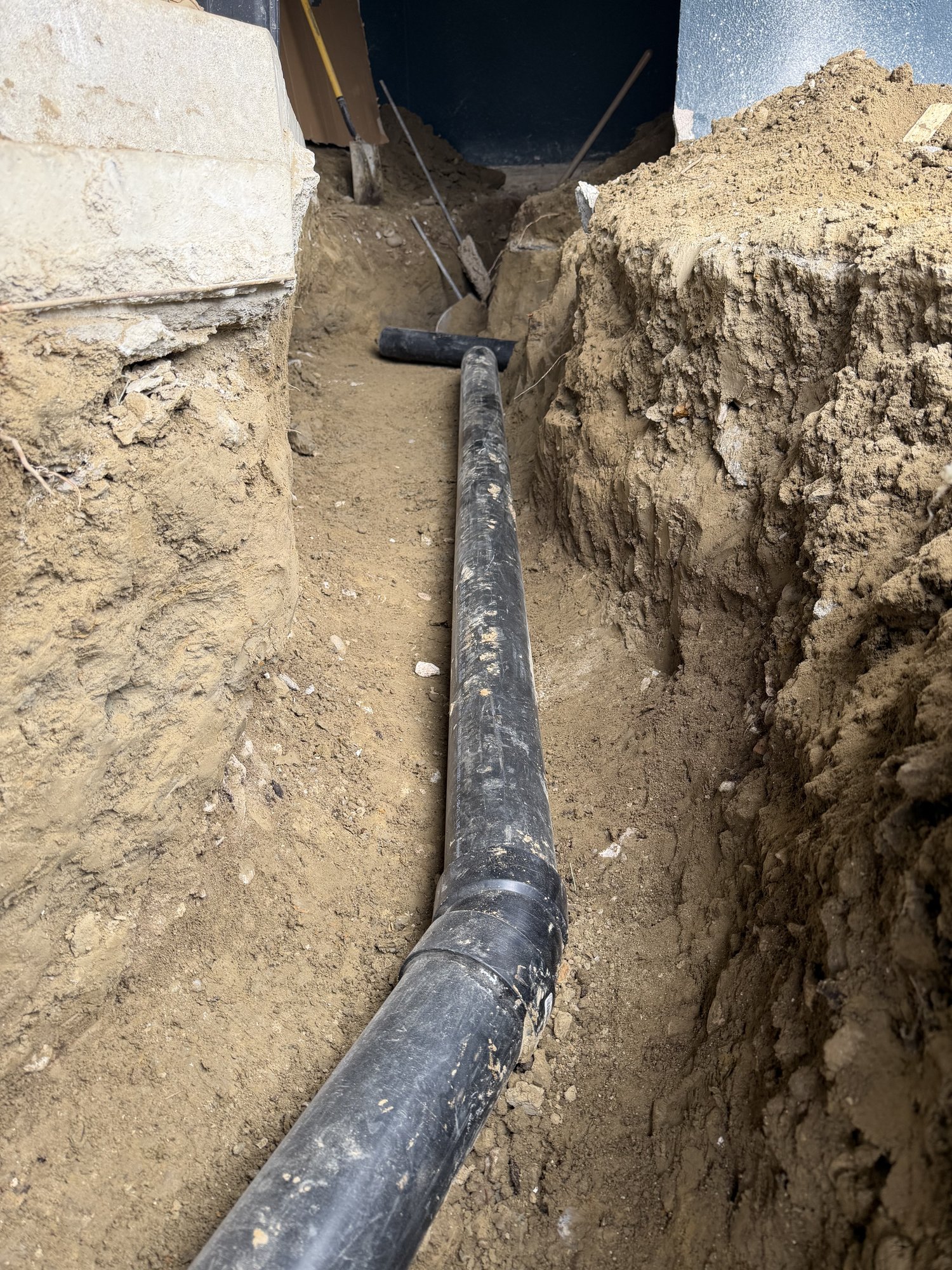 New drain line trench for bathroom rough-in — J Sammy Home Services